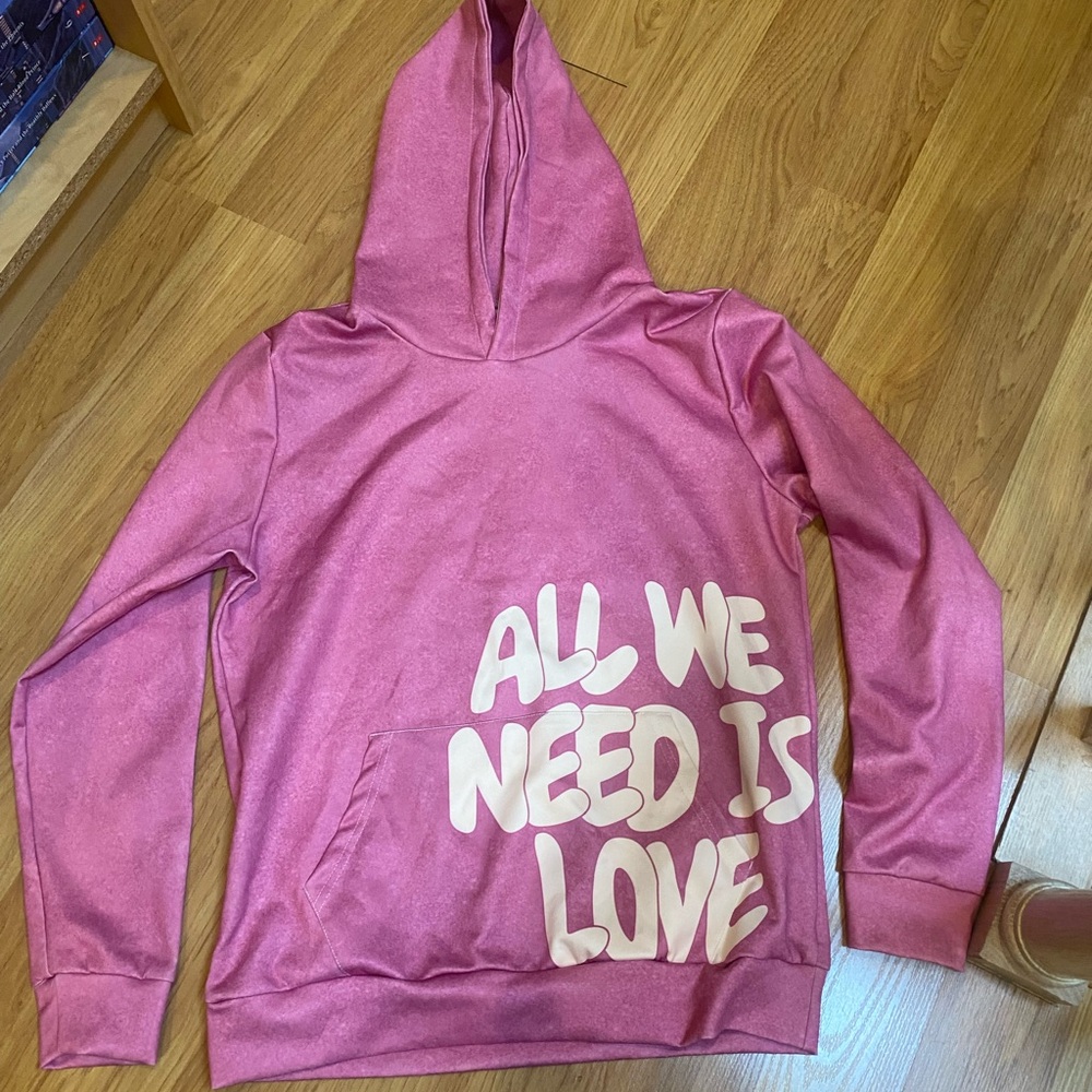 Pink Hoodie with 'All We Need Is Love' Print